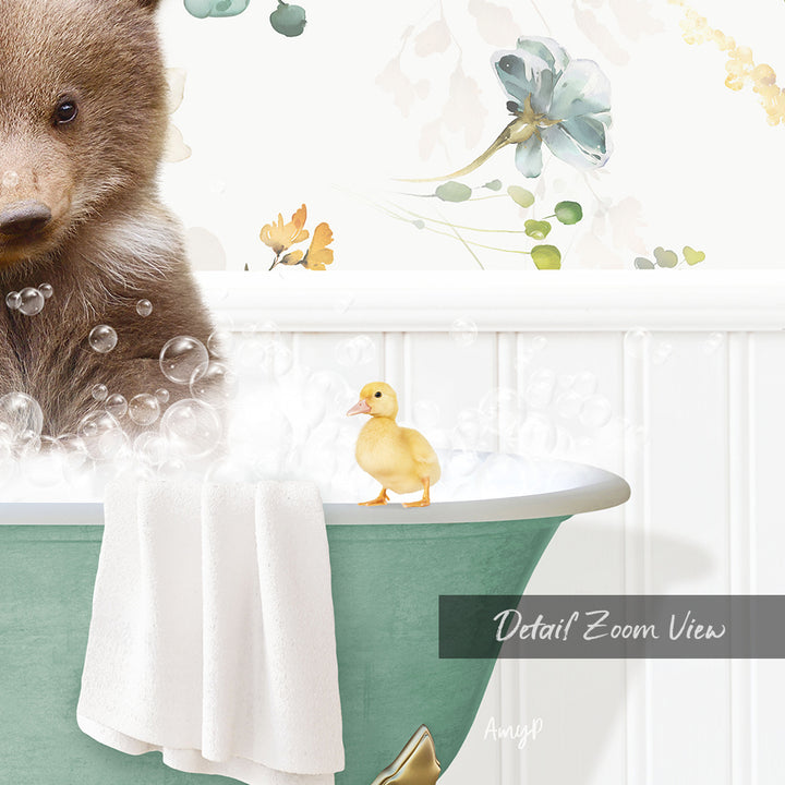 A brown bear is sitting in a bathtub filled with bubbles, with a yellow duck standing on the edge of the tub.