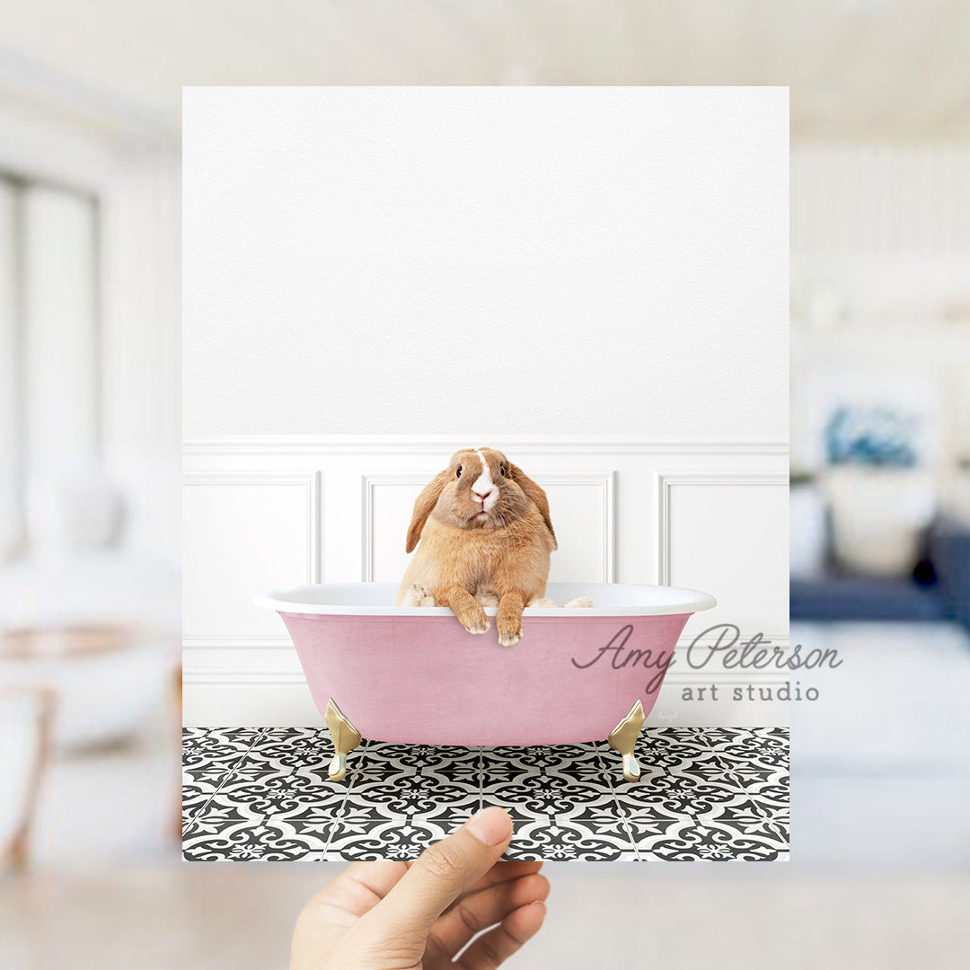 a rabbit sitting in a pink bath tub