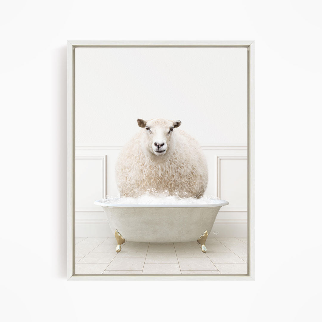 A fluffy white sheep sits in a white bathtub filled with bubbles, creating a whimsical and amusing scene.