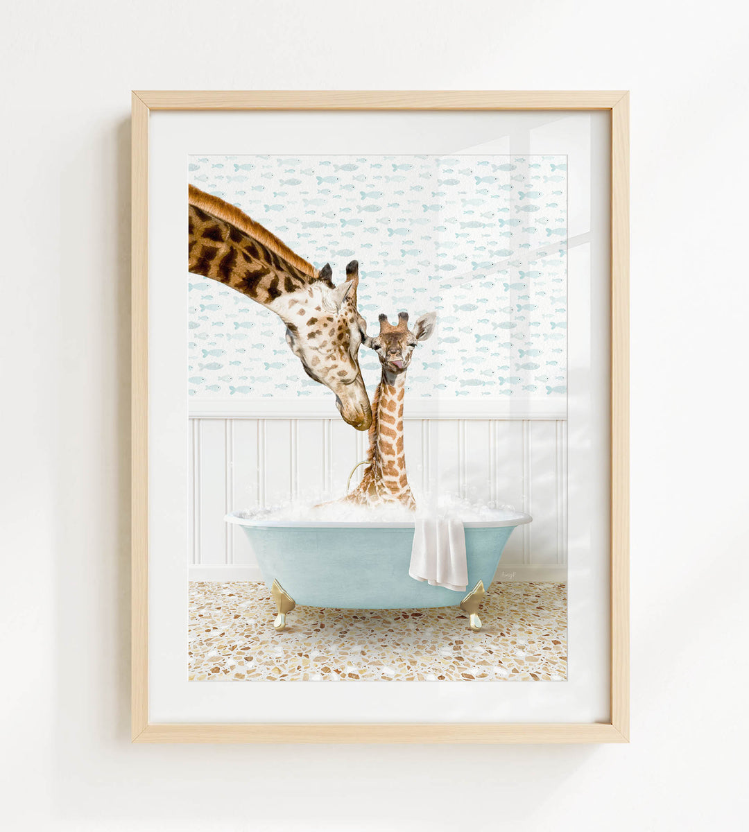 A giraffe and a baby giraffe are sitting in a blue bathtub filled with water, with the baby giraffe looking up at the adult giraffe.