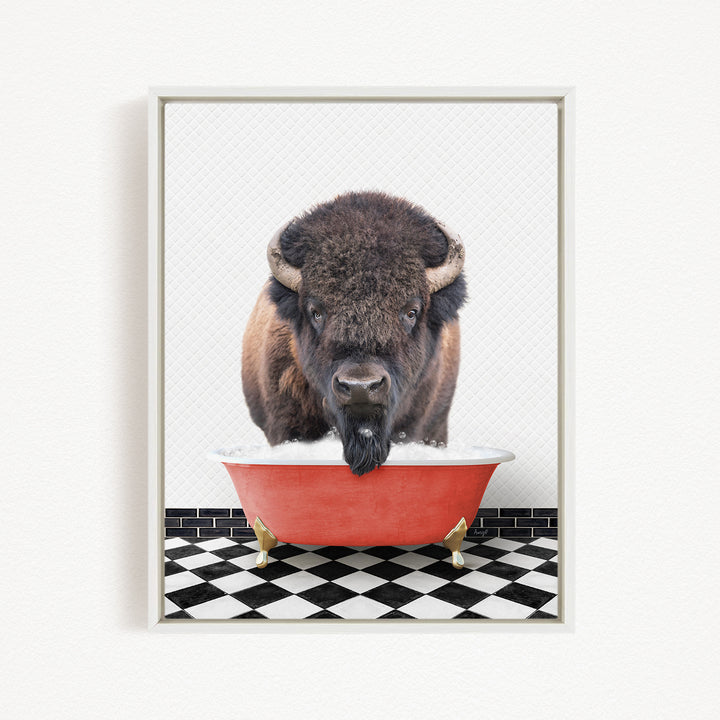A buffalo with a black mane and horns is standing in a red bathtub filled with water, with a black and white checkered floor beneath it.