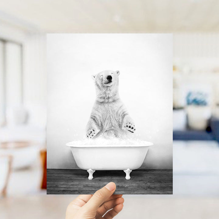 A polar bear standing in a bathtub filled with water, appearing to be enjoying a bath.