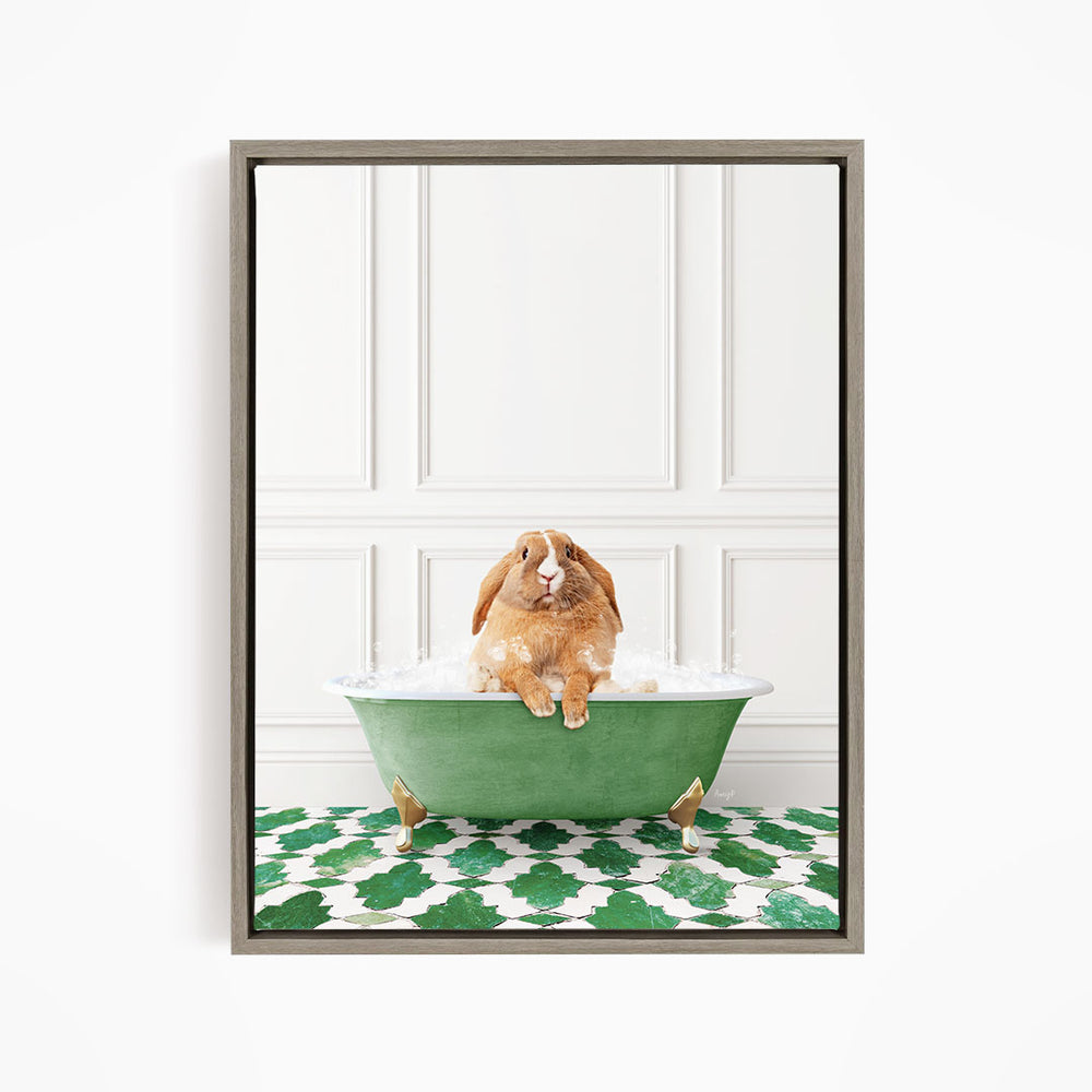 A brown rabbit sitting in a green bathtub filled with water, surrounded by a green and white patterned floor.