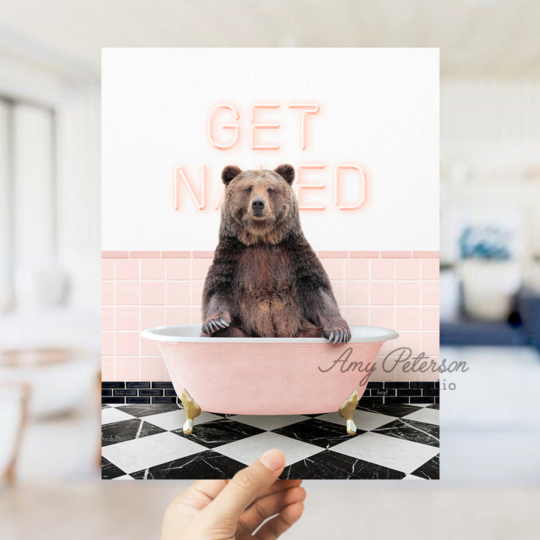 a person holding up a card with a picture of a bear in a bathtub