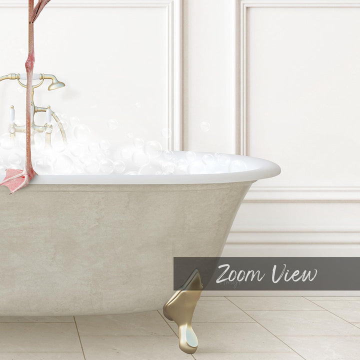 A white clawfoot bathtub filled with water, with a pink flower hanging from the side.