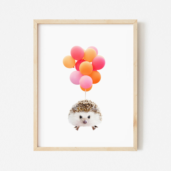 a hedgehog with a bunch of balloons floating in the air