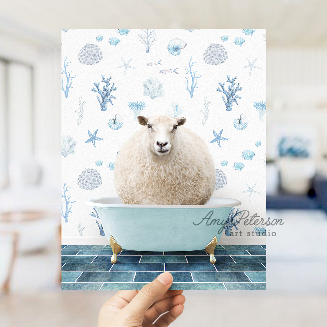 a hand holding up a card with a sheep in a bathtub