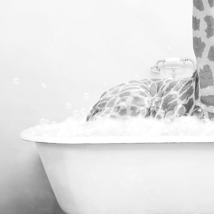 a giraffe sticking its head out of a bathtub