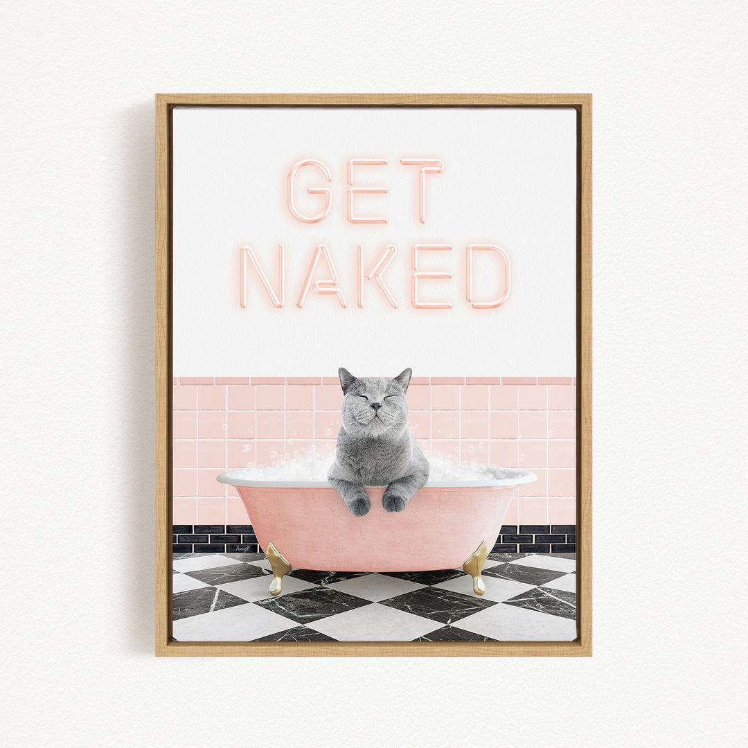 A framed image depicting a gray cat sitting in a pink bathtub, with the text "GET NAKED" displayed above it.