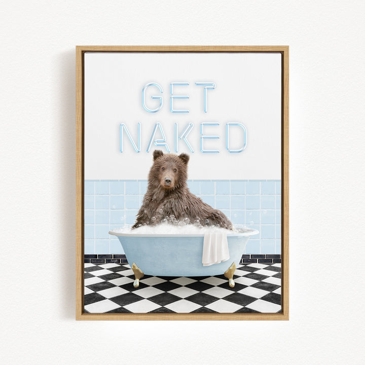 A brown bear sitting in a blue bathtub with the text "GET NAKED" displayed above it.