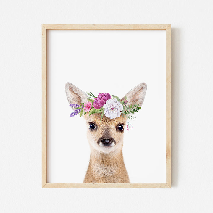 a picture of a deer wearing a flower crown