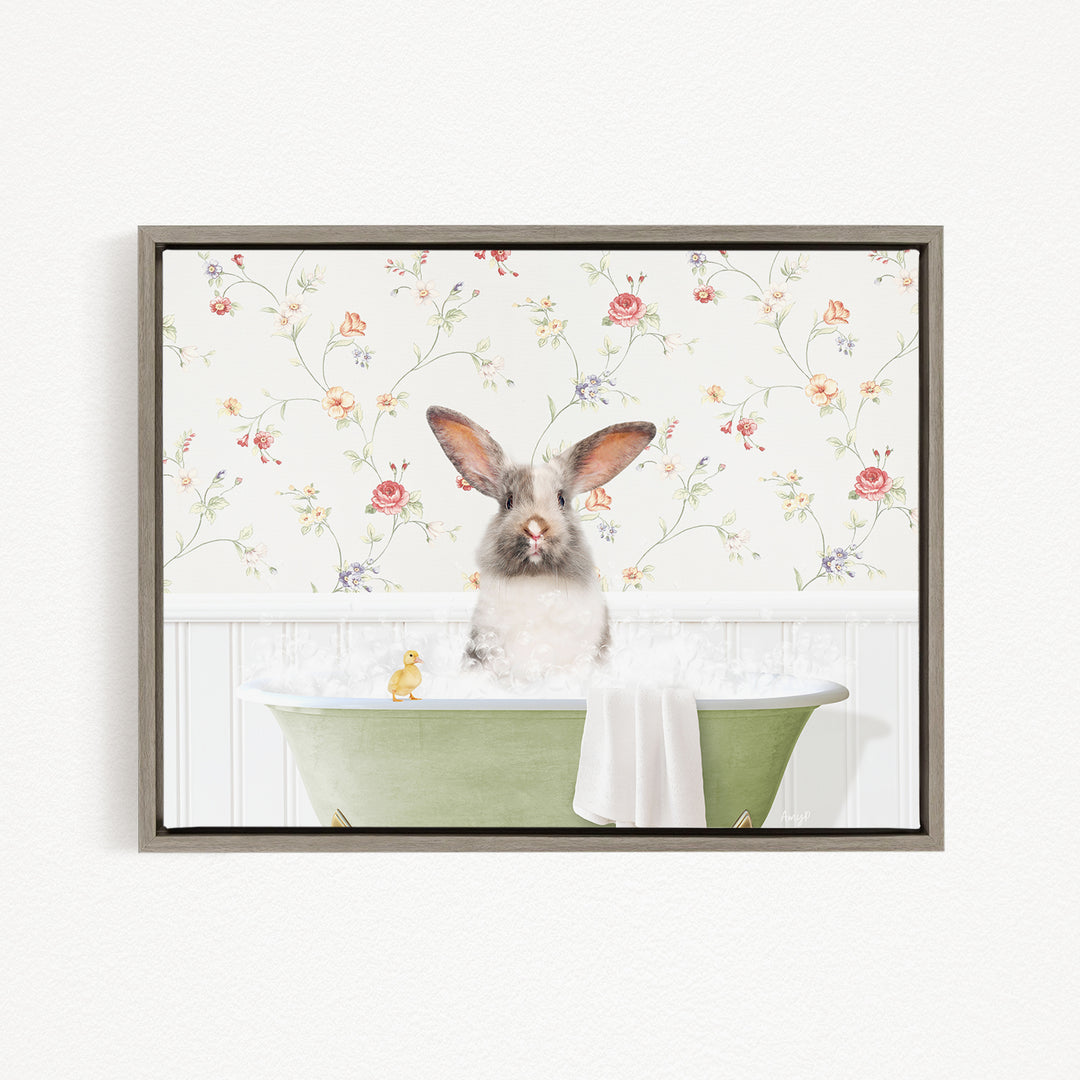 A fluffy white rabbit sits in a green bathtub, surrounded by a floral wallpaper and a yellow duck.
