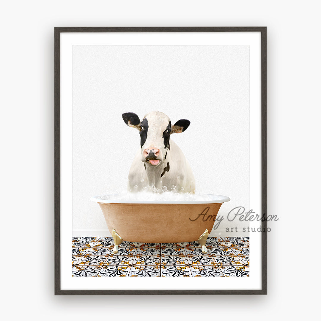 a cow sitting in a bathtub with its tongue out