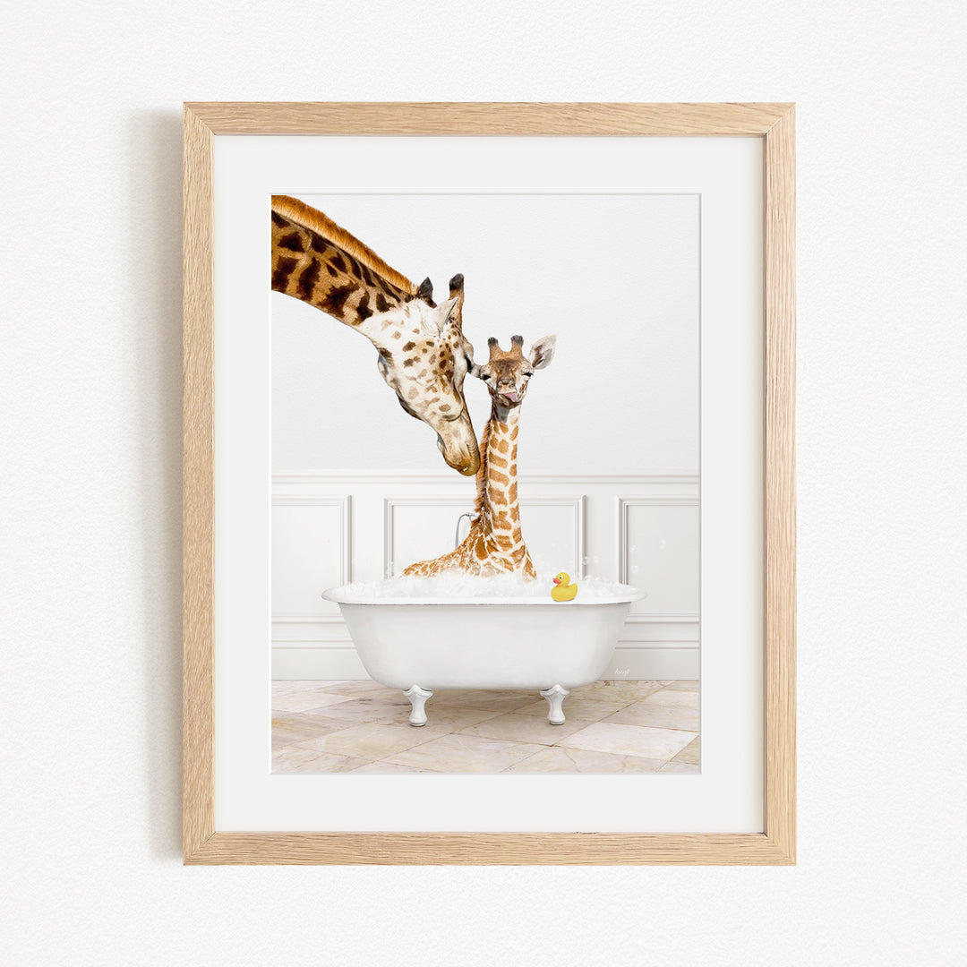 A mother giraffe and her baby giraffe are enjoying a bath together in a white bathtub, with a yellow rubber duck floating in the water.