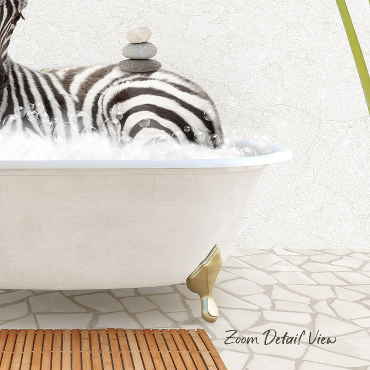 A zebra standing in a bathtub filled with water, with a stack of rocks on its back.