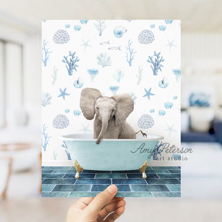 a person holding up a card with an elephant in a bathtub