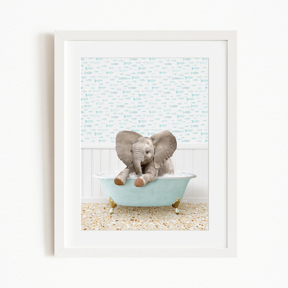 A baby elephant sitting in a light blue bathtub, surrounded by a patterned wall and a beige floor.