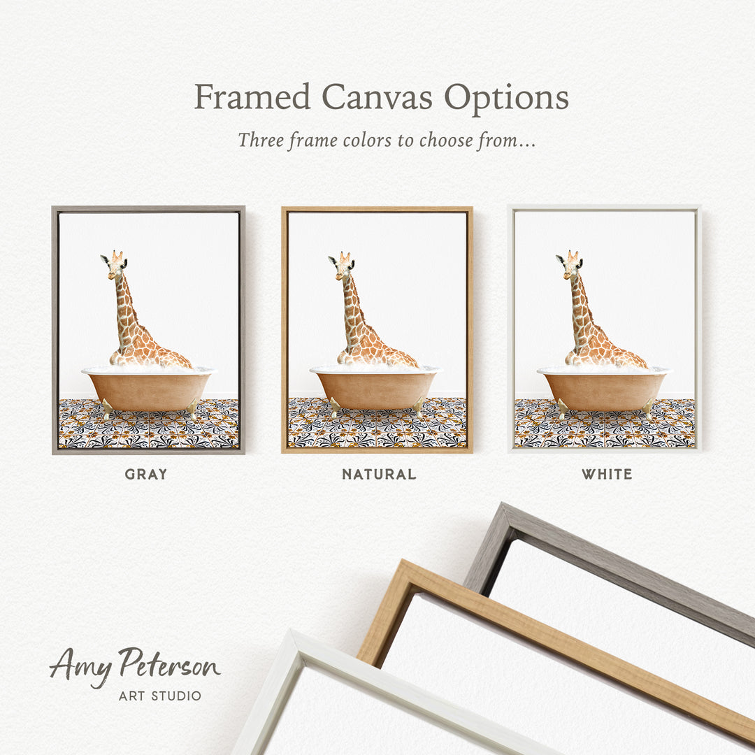 three framed canvas options for a giraffe bath, each with a different frame color: gray, natural, and white.