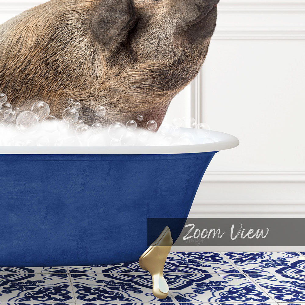 A pig is sitting in a blue bathtub filled with bubbles, with its head submerged in the water.
