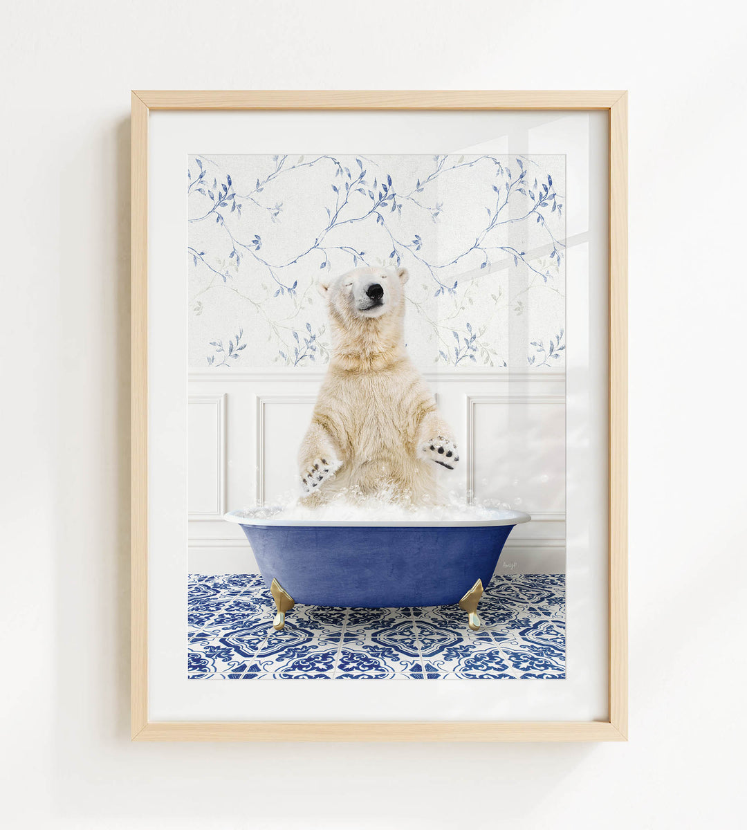 A polar bear sitting in a blue bathtub filled with water, surrounded by a patterned tile floor.