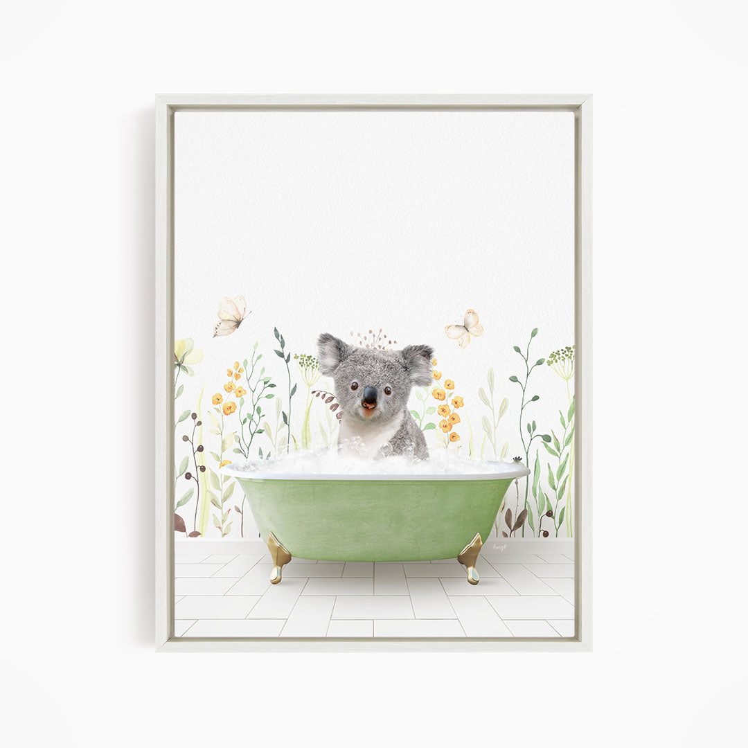 A koala bear sitting in a green bathtub filled with bubbles, surrounded by flowers and butterflies.