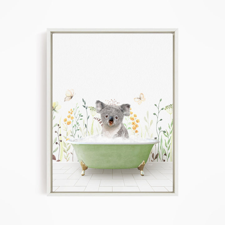 A koala bear sitting in a green bathtub filled with bubbles, surrounded by flowers and butterflies.