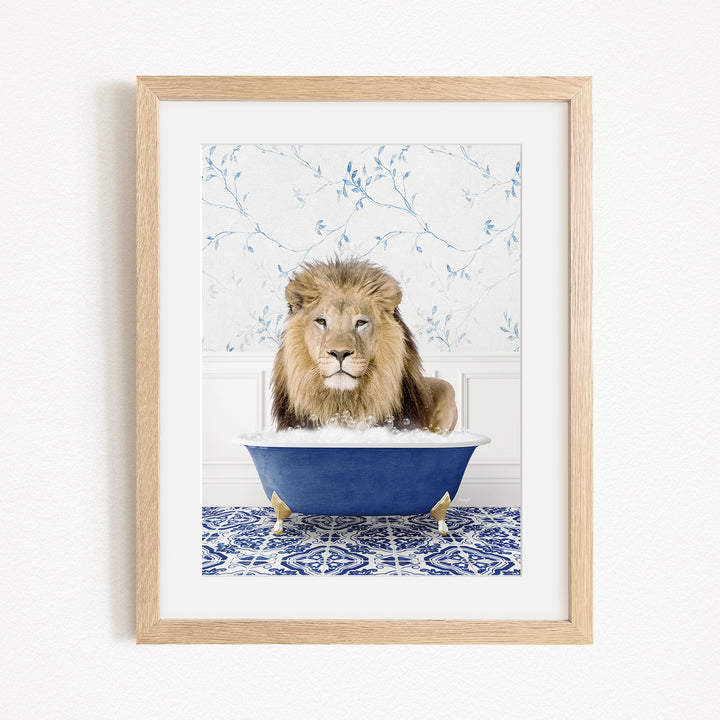 A lion sitting in a blue bathtub, surrounded by a blue and white patterned rug.