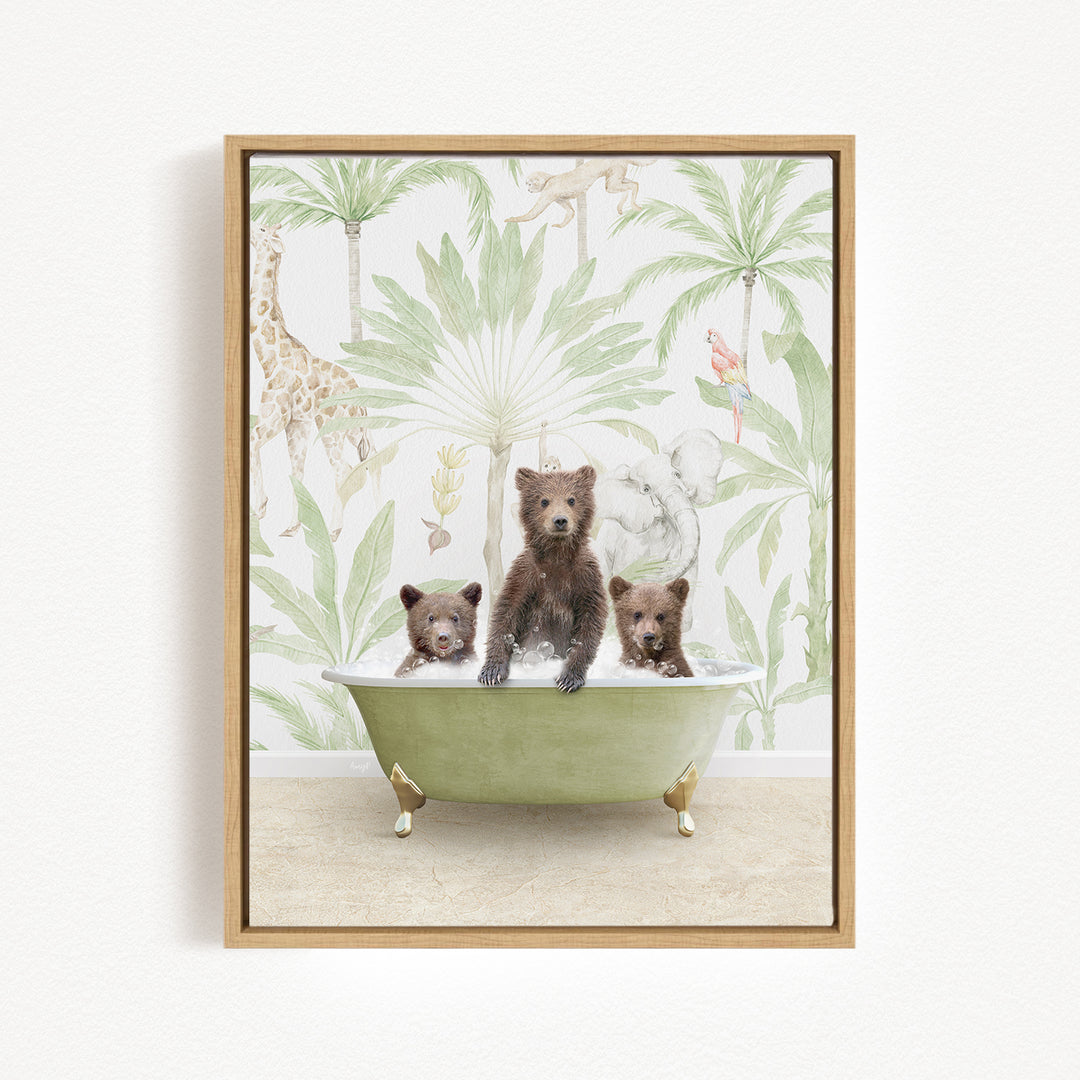 A framed image depicting three bears sitting in a green bathtub, surrounded by a tropical jungle wallpaper.