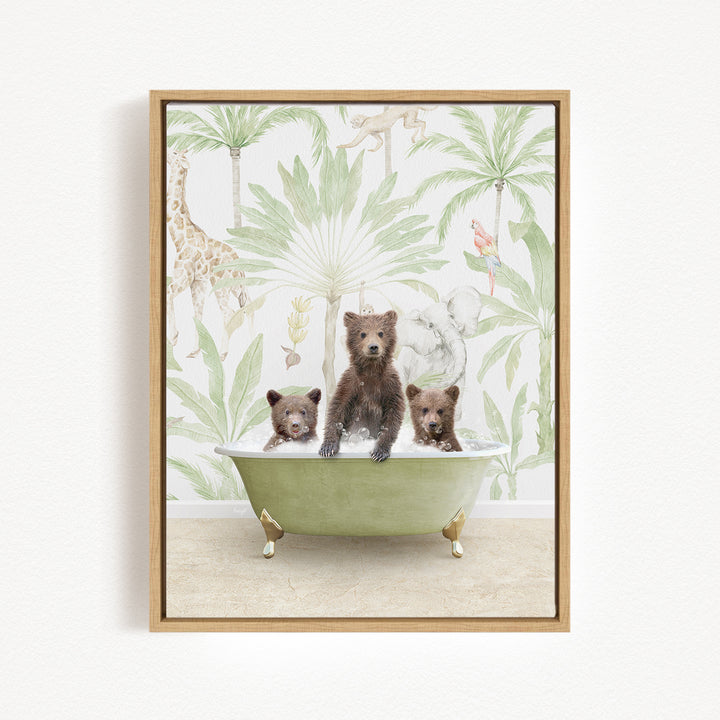 A framed image depicting three bears sitting in a green bathtub, surrounded by a tropical jungle wallpaper.