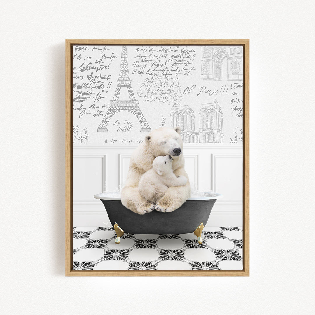 A polar bear is sitting in a bathtub, with another polar bear sitting on its lap, in a bathroom setting with a Paris Eiffel Tower and other buildings visible in the background.