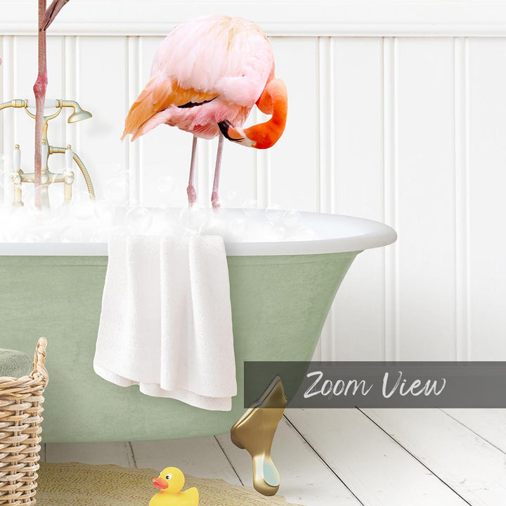A pink flamingo stands in a bathtub filled with water, surrounded by a yellow rubber duck and a white towel.