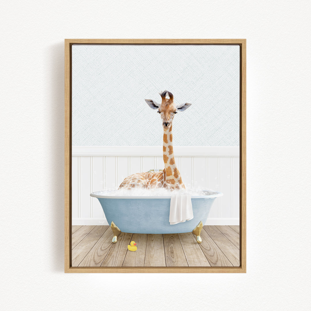 A giraffe is sitting in a blue bathtub filled with water, surrounded by a white wall and wooden floor.