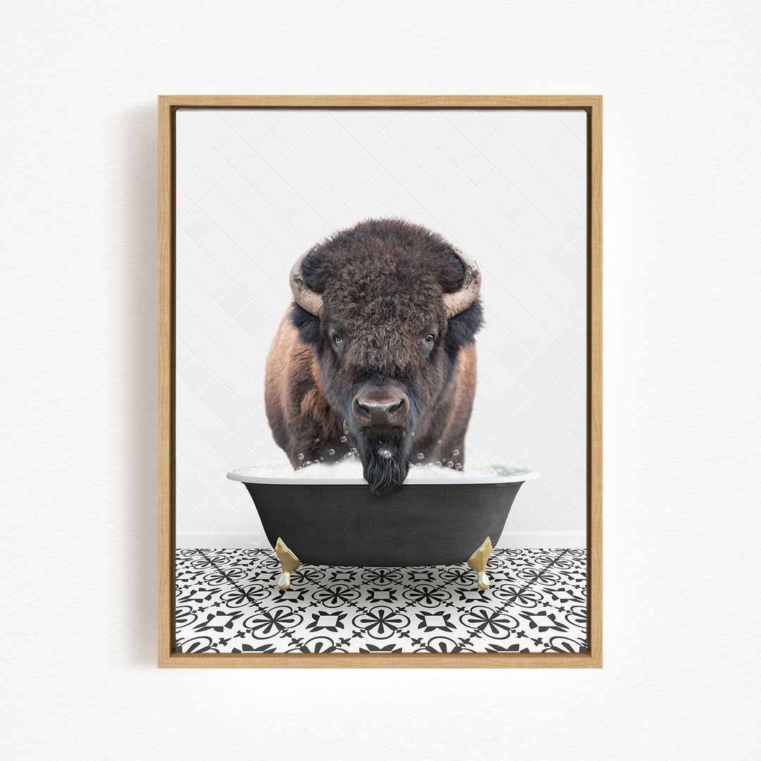 A buffalo with large horns is standing in a bathtub filled with water, creating a playful and whimsical scene.