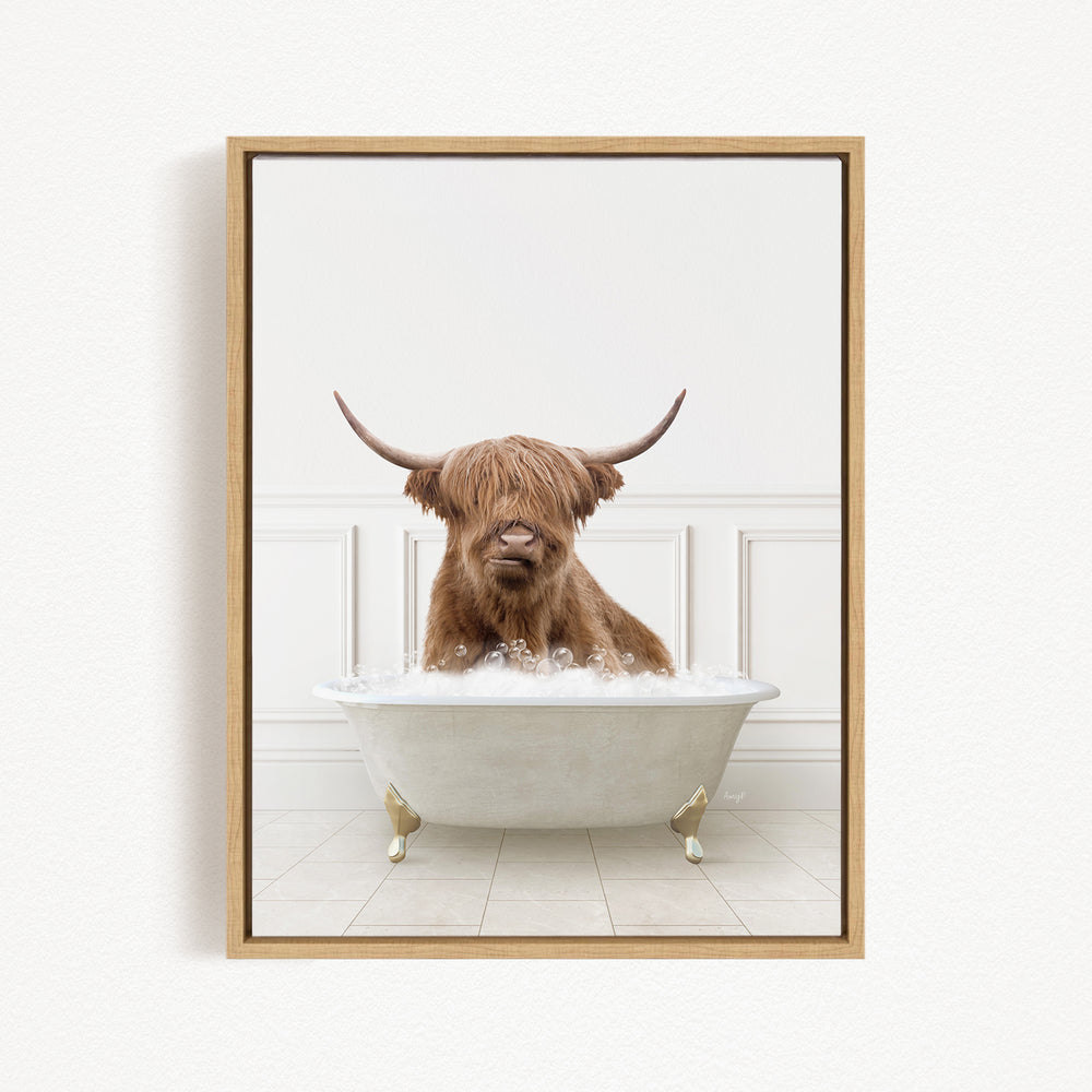 A brown cow with long horns is sitting in a white bathtub filled with bubbles, creating a whimsical and playful scene.