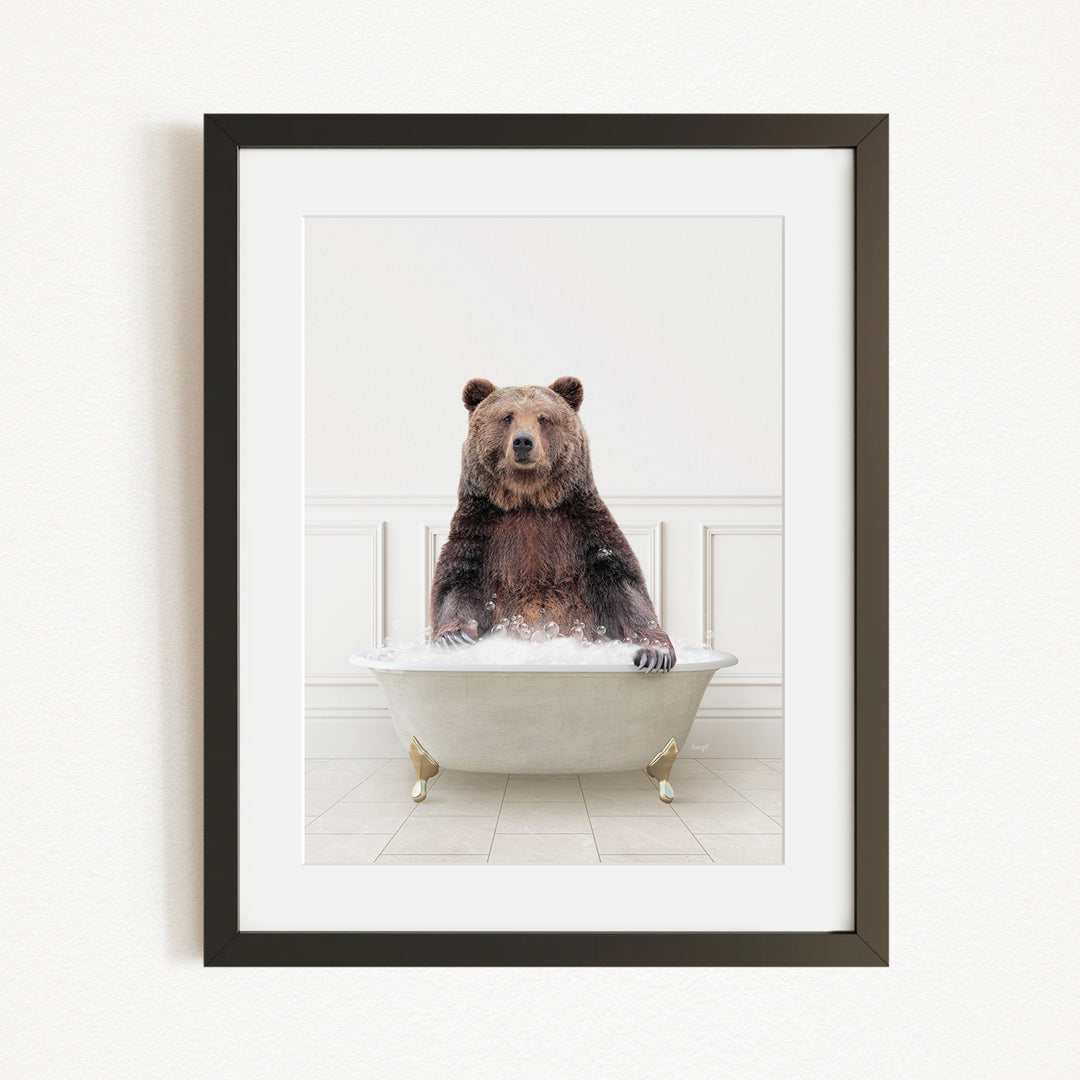 A brown bear sitting in a white bathtub filled with water, creating a whimsical and humorous scene.