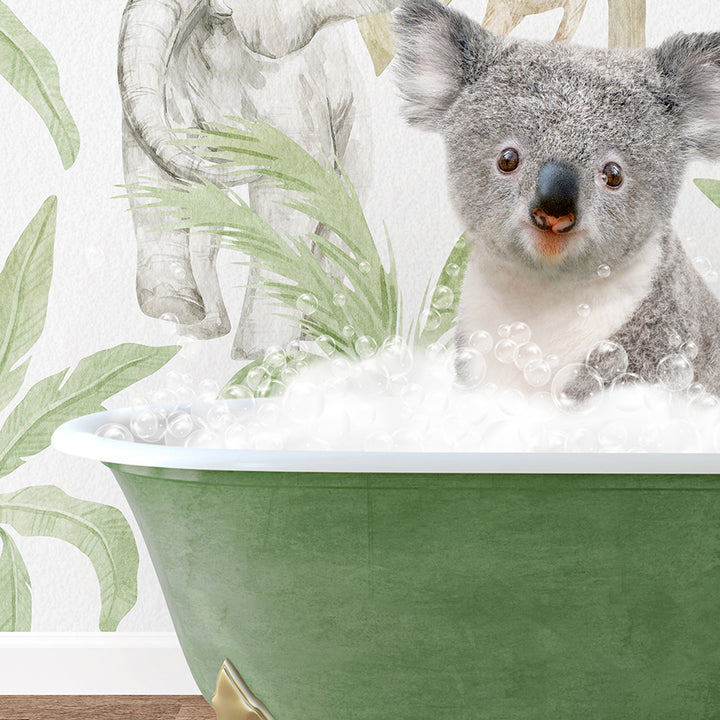 a koala sitting in a bathtub with bubbles