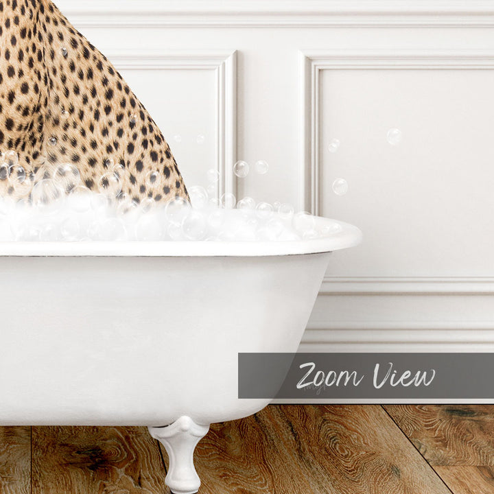 A leopard print bath mat is placed on a white bathtub, with bubbles forming around it.