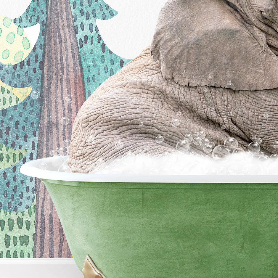 an elephant is taking a bath in a green bowl