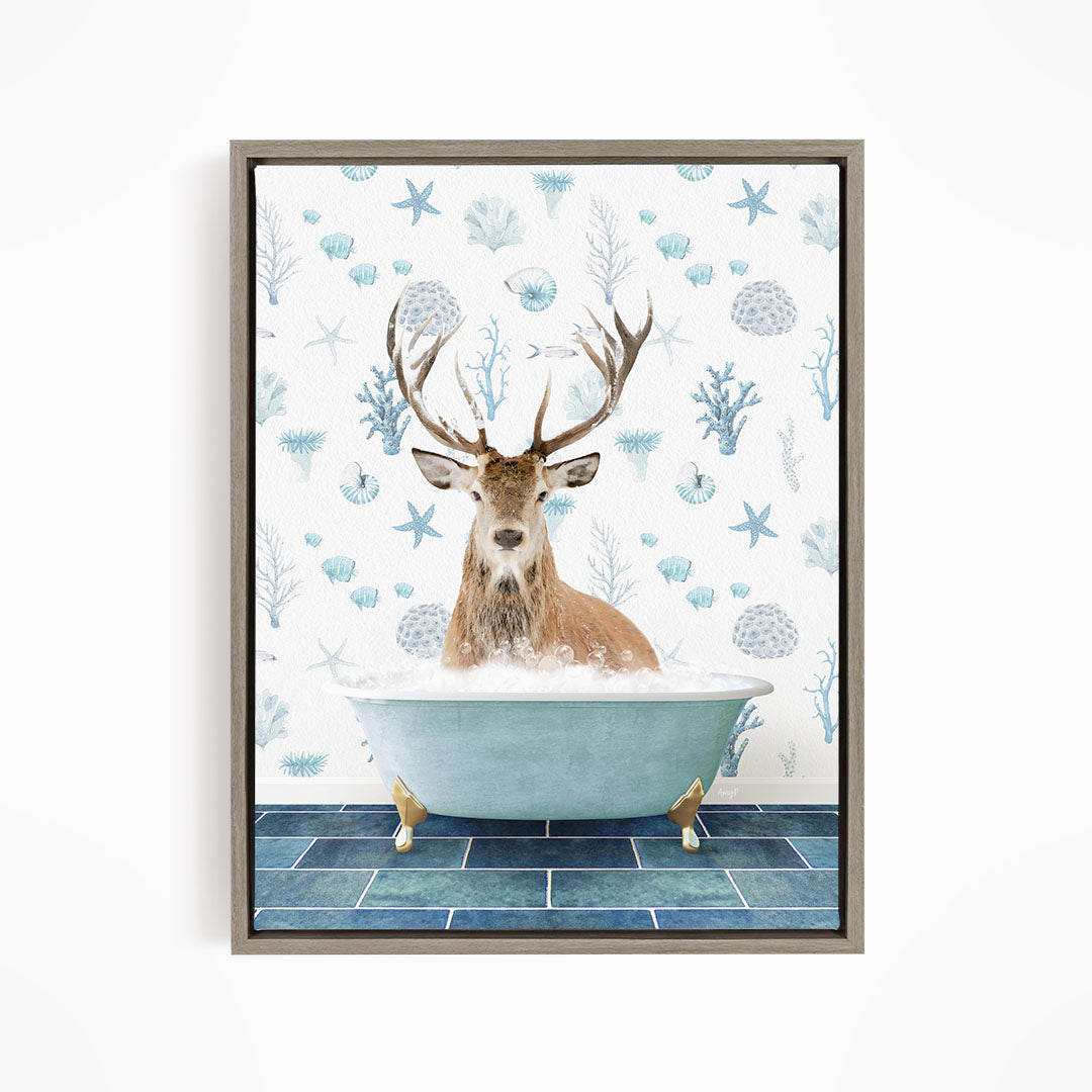 A deer with antlers is sitting in a bathtub filled with bubbles, surrounded by a pattern of blue and white seashells and starfish.