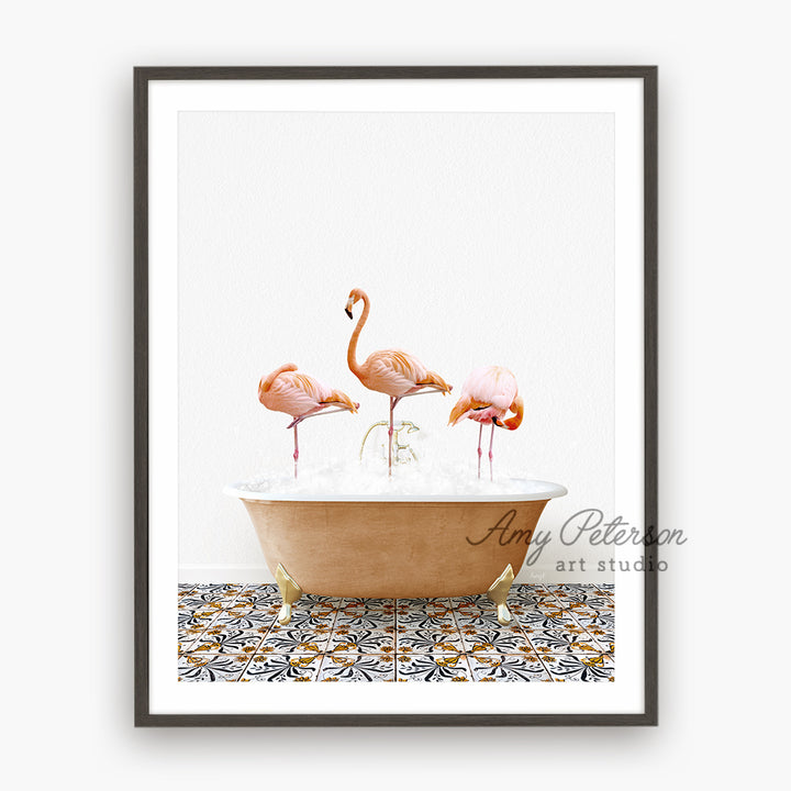 three flamingos in a bathtub with ice