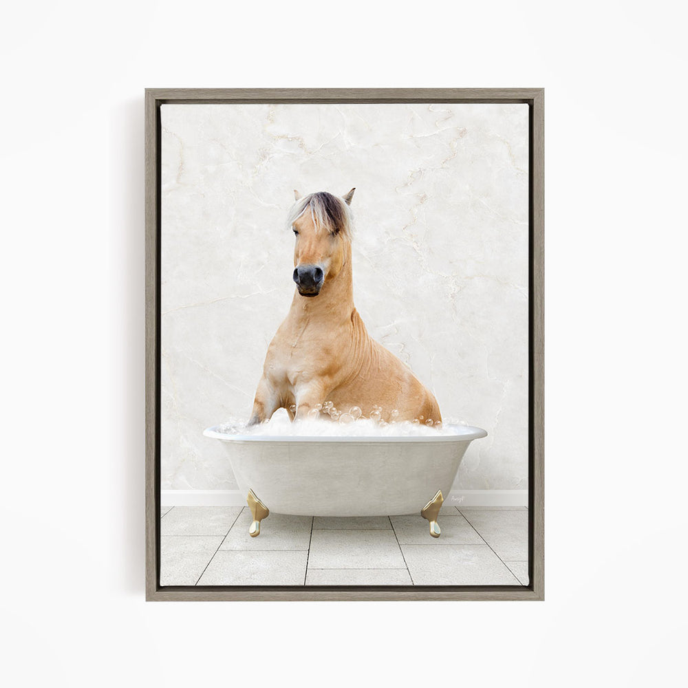 A light brown horse is sitting in a white bathtub filled with water, creating a whimsical and playful scene.