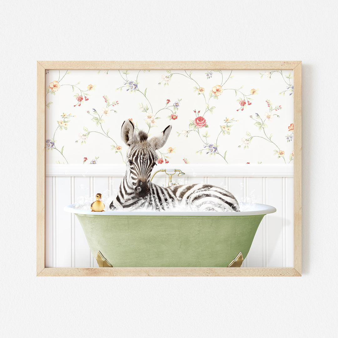 a zebra laying in a green bath tub