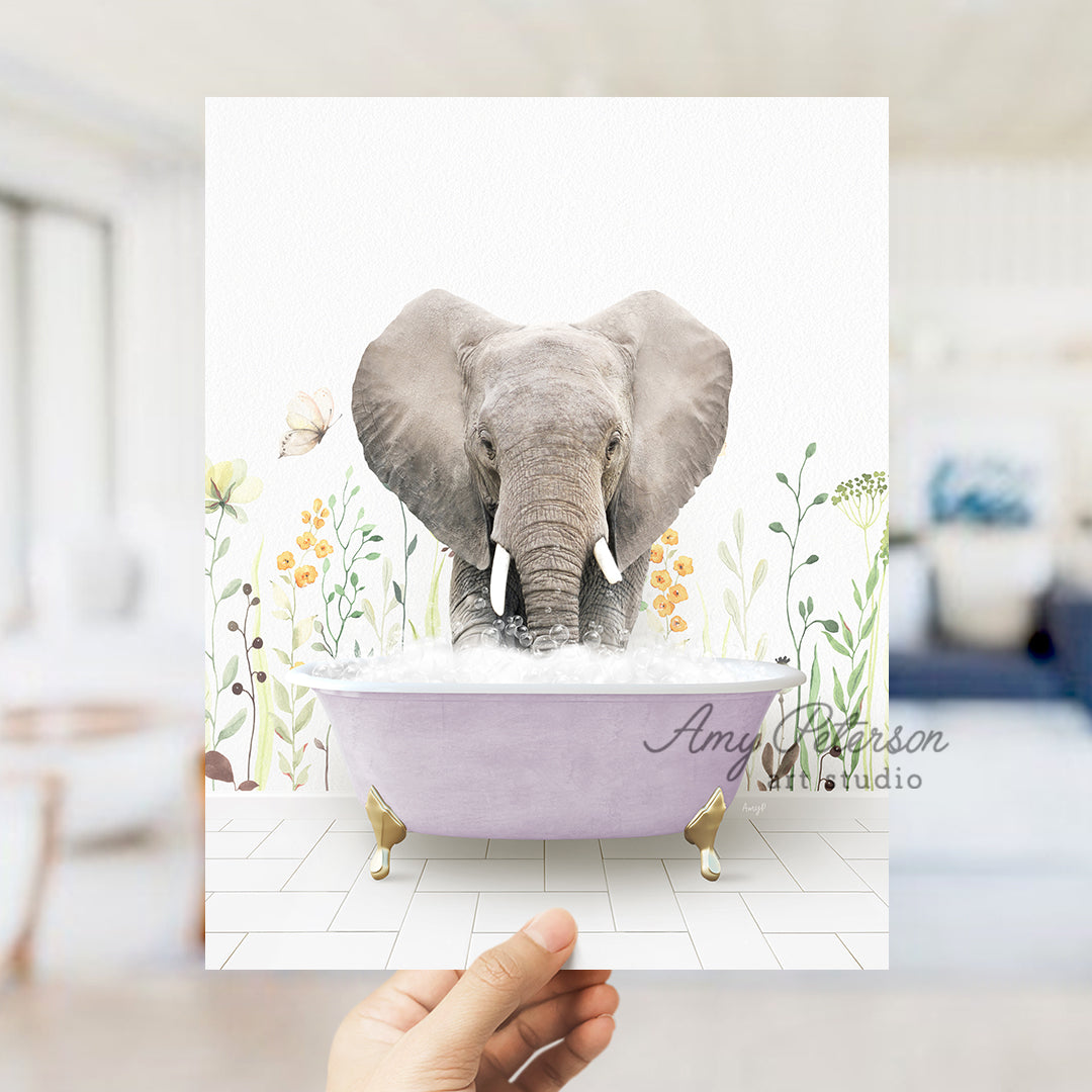 a person holding up a card with an elephant in a bathtub