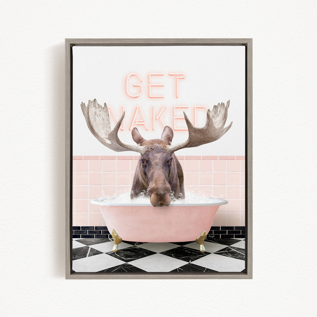 A moose is sitting in a pink bathtub, with the words "GET NAKED" written above it.