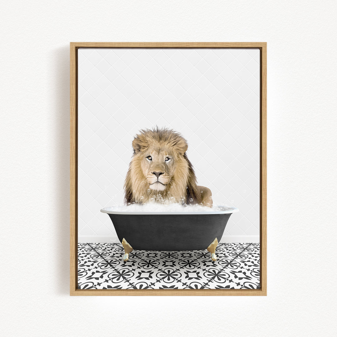 A lion sitting in a bathtub filled with bubbles, looking directly at the camera.