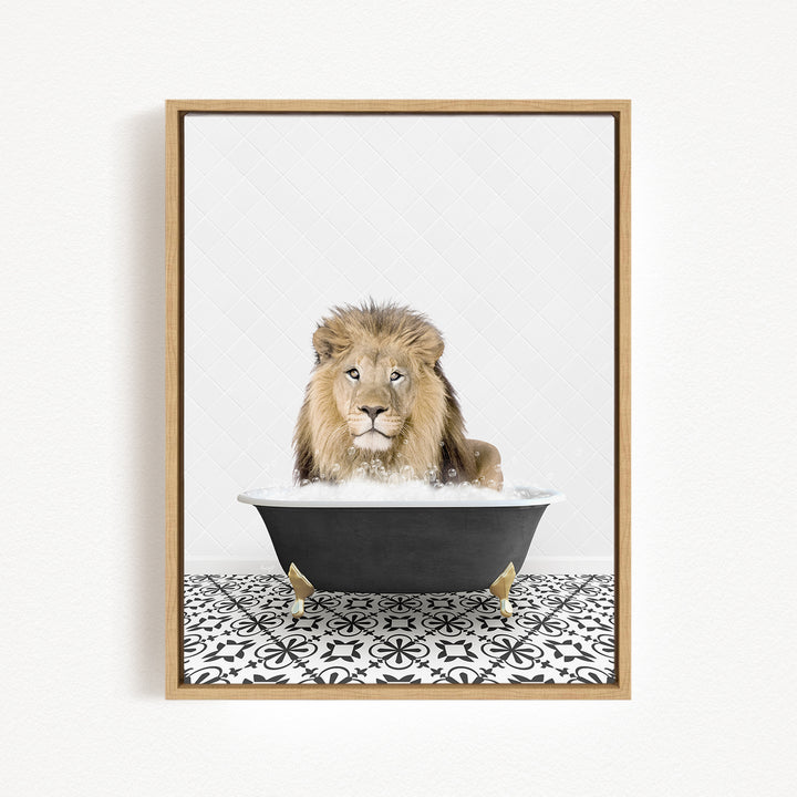A lion sitting in a bathtub filled with bubbles, looking directly at the camera.