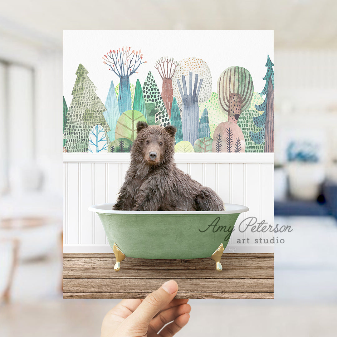 a person holding up a card with a picture of a bear in a bathtub