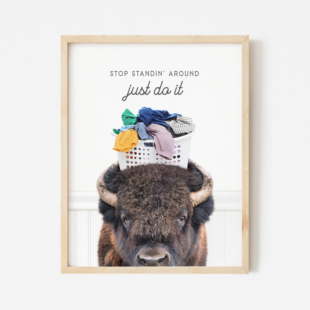 a picture of a bison with a pile of clothes on its head