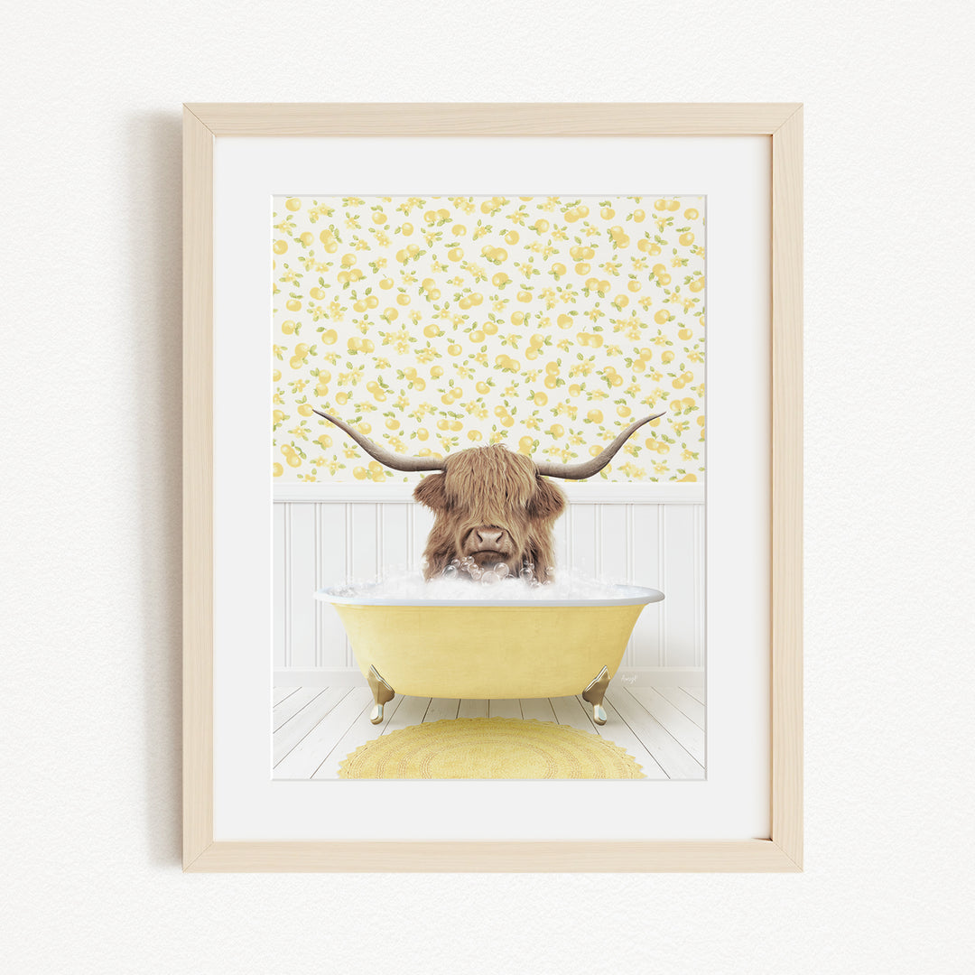 A brown cow with long horns is sitting in a yellow bathtub, surrounded by a yellow floral pattern on the wall behind it.