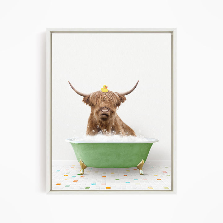 A Highland cow with long horns is sitting in a green bathtub filled with bubbles, with a rubber duck perched on its head.